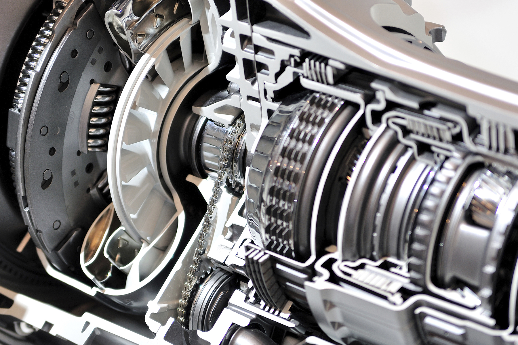 A detailed cross-section of an automotive transmission, showcasing gears and mechanical components.