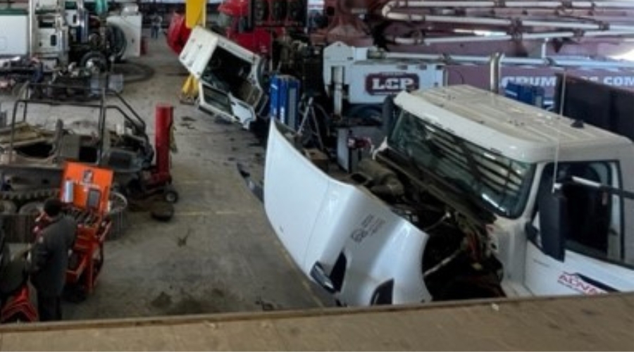 Expert Diesel Truck Diagnostics in Alexandria, LA with Consolidated Truck Parts & Service. Image of full shop bay with semi and commercial fleet trucks all in a row.