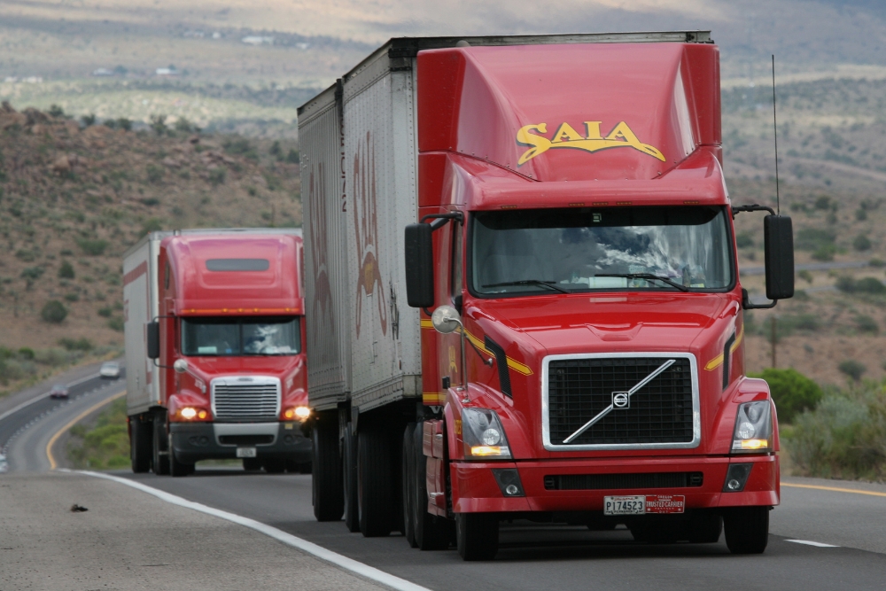 2025 Trucking Regulations Guide In Many LA At Consolidated Truck. Trucks on the road.