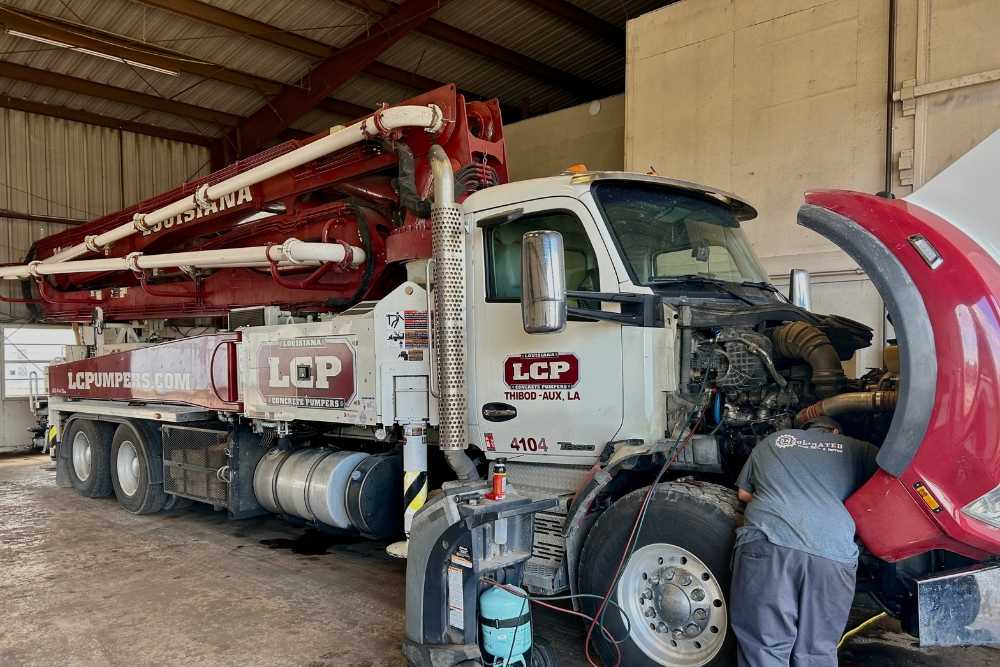 Holiday Fleet Maintenance, Fleet Maintenance in Lafayette LA at Consolidated Truck. Truck undergoing fleet maintenance at an auto repair shop