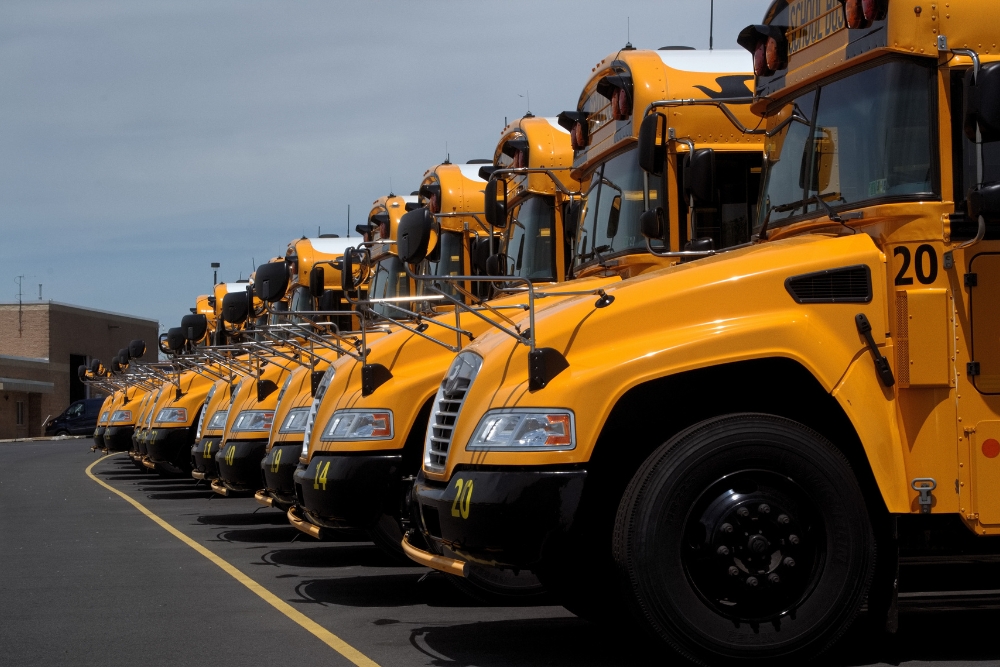 Bus Fleet Maintenance in Alexandria LA At Consolidated Truck. Fleet of yellow school buses parked